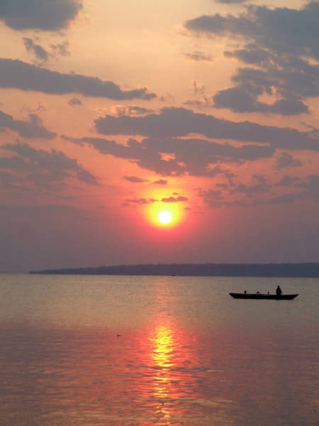 red_moon_over_lake_tanganyika_by_boat